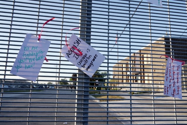 CAPTION CORRECTS LOCATION - People protest outside a federal immigration enforcement building in Broadview, Ill. on Friday, Sept. 26, 2025. (AP Photo/Laura Bargfeld)