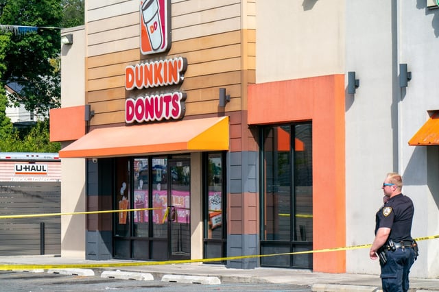 A 13-year-old boy was shot in the head outside a Dunkin' Donuts near Springfield and Linden Blvds. in Cambria Heights, Queens on Monday, Sept. 22, 2025. (Theodore Parisienne / New York Daily News)