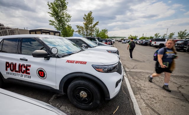 University of Utah police vehicles are parked outside the Public Safety building in Salt Lake City on Wednesday, Aug. 27, 2025.
