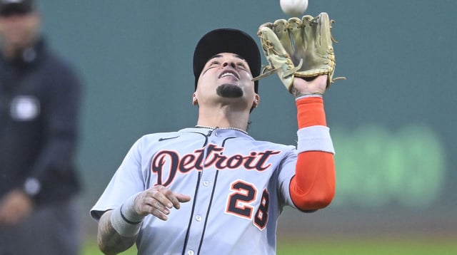 Sep 25, 2025; Cleveland, Ohio, USA; Detroit Tigers shortstop Javier Baez (28) catches a fly ball in the first inning against the Cleveland Guardians at Progressive Field. Mandatory Credit: David Richard-Imagn Images
