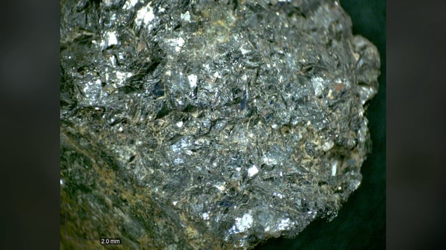 Sparkly hematite mineral was used as a flux by copper smelters. Its distinctive appearance may have helped to attract attention from ancient miners and prospectors.