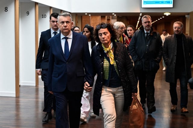 Gilles Artigues et sa femme, ce 26 septembre. (Photo by Matthieu Delaty / Hans Lucas via AFP)