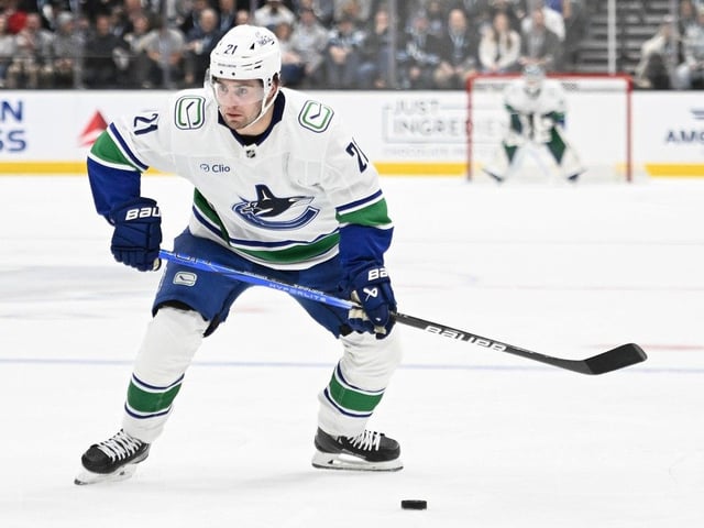 File photo: Nils Höglander #21 of the Vancouver Canucks shoots during the second period of a game against the Utah Hockey Club at Delta Center on Feb. 23, 2025 in Salt Lake City, Utah.