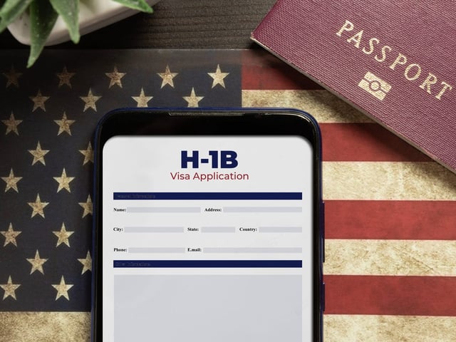 Wall Street is bracing for the impacts of President Trump's new $100,000 H-1B application fee.