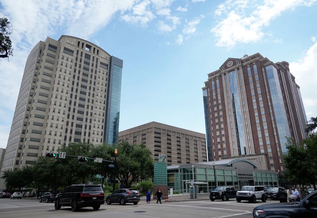 The Harris County Criminal Justice Center, 1201 Franklin St., left, and the Harris County Civil Courthouse, 201 Caroline St., are shown Wednesday, Sept. 25, 2024, in Houston. On Friday morning, a man charged with the murder of his wife experienced a medical emergency in court and later died at Ben Taub Hospital. 