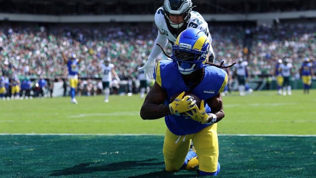 Sep 21, 2025; Philadelphia, Pennsylvania, USA; Los Angeles Rams wide receiver Davante Adams (17) makes a touchdown catch over Philadelphia Eagles safety Reed Blankenship (32) during the first half at Lincoln Financial Field. Mandatory Credit: Bill Streicher-Imagn Images