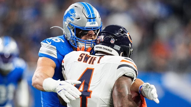 Detroit Lions linebacker Jack Campbell (46) tackles Chicago Bears running back D'Andre Swift (4) during the first half at Ford Field in Detroit on Sunday, Sept. 14, 2025. Mandatory Credit: © Junfu Han / USA TODAY NETWORK via Imagn Images