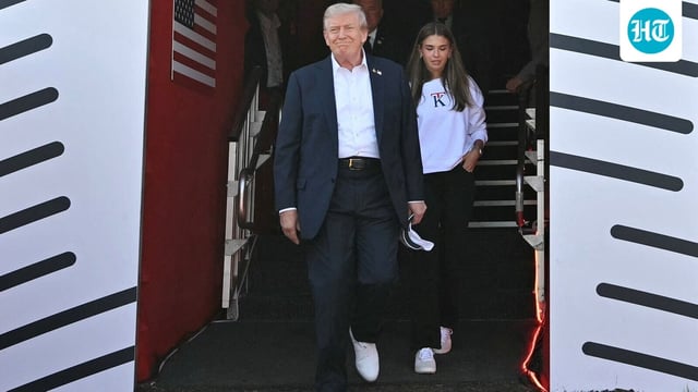 U.S. President Donald Trump and his granddaughter Kai Trump attend the 45th Ryder Cup golf competition at Bethpage Black Golf Course in Farmingdale, New York.