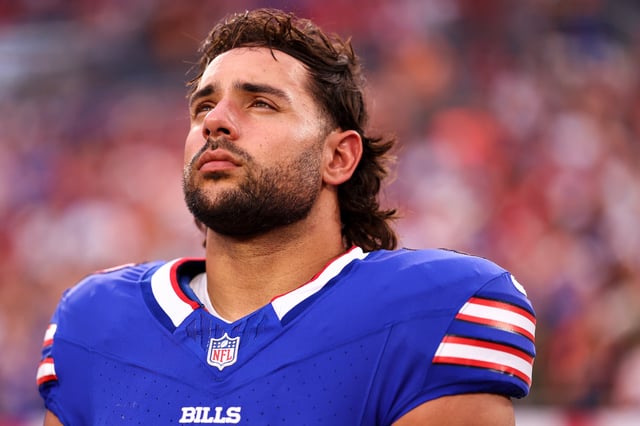 TAMPA, FLORIDA - AUGUST 23: Matt Milano #58 of the Buffalo Bills stands on the sidelines during the national anthem prior to an NFL preseason football game against the Tampa Bay Buccaneers at Raymond James Stadium on August 23, 2025 in Tampa, Florida. (Photo by Kevin Sabitus/Getty Images)