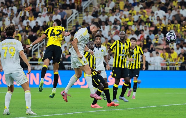 Soccer Football - Saudi Pro League - Al Ittihad v Al Nassr - King Abdullah Sport City Stadium, Jeddah, Saudi Arabia - September 26, 2025 Al Nassr's Cristiano Ronaldo scores their second goal REUTERS/Stringer