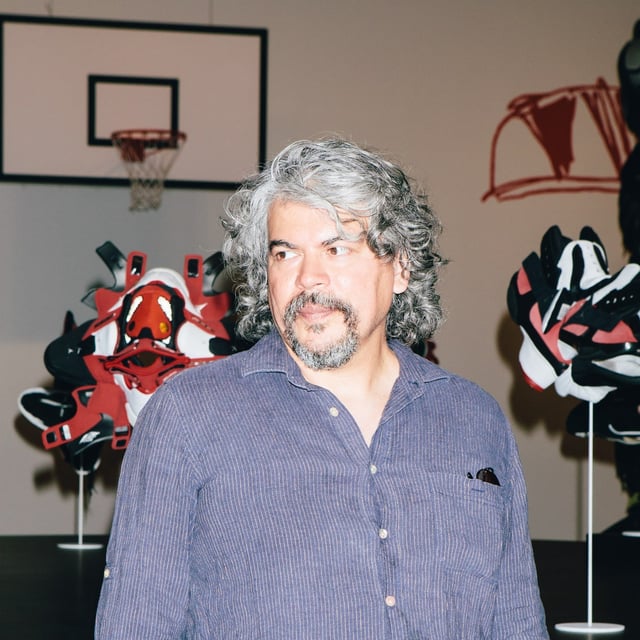 Artist Brian Jungen is seen in the midst of Friendship Centre, an installation of his sculptures assembled as a basketball court, at the Art Gallery of Ontario on June 16, 2019.
