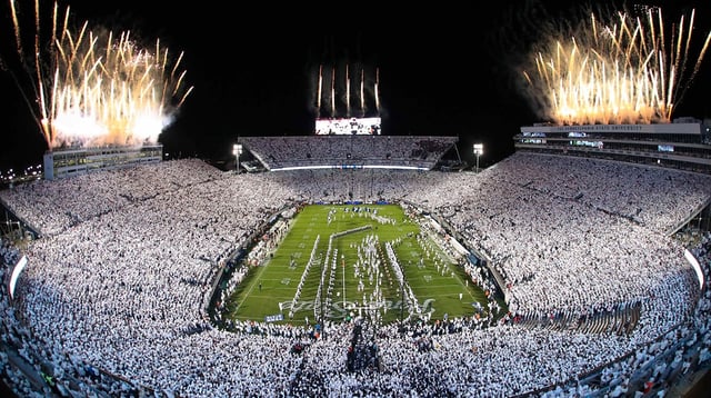 Nov 9, 2024; University Park, Pennsylvania, USA; Fireworks burst overhead as the Penn State Nittany Lions take the field prior to a White Out game against the Washington Huskies at Beaver Stadium. Mandatory Credit: Matthew O'Haren-Imagn Images