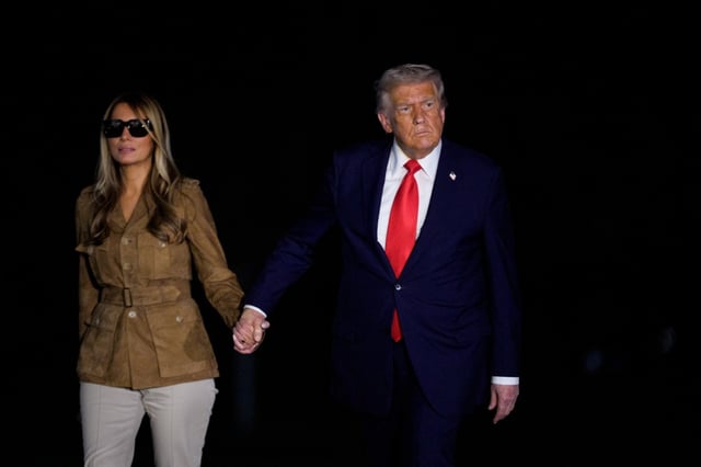 WASHINGTON, DC – SEPTEMBER 18: U.S. President Donald Trump and first lady Melania Trump arrive at the White House on September 18, 2025 in Washington, DC. Trump returned following his second UK state visit, with the previous one taking place in 2019 during his first presidential term. (Photo by Andrew Harnik/Getty Images)