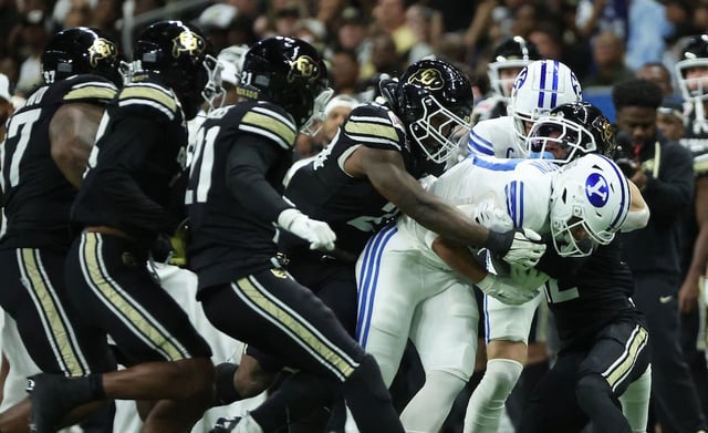 BYU running back LJ Martin runs through the Colorado Buffaloes' defense during the Valero Alamo Bowl in San Antonio on Saturday, Dec. 28, 2024. The two teams meet again Saturday in Boulder.