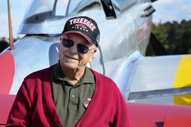 U.S. Air Force retired Lt. Col. George E. Hardy, a Tuskegee Airman, stands next to his former P-51D Mustang at Royal Air Force Lakenheath, England, on Oct. 4, 2016.