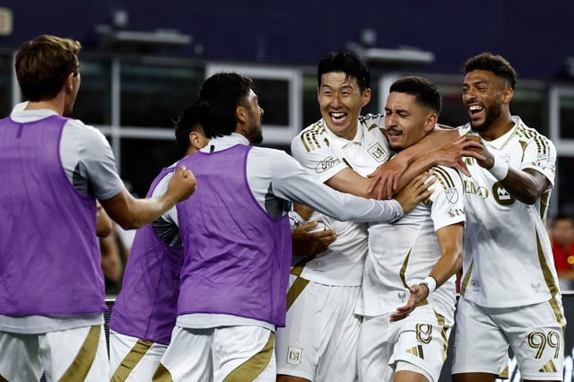 Mark Delgado (8) celebrates with LAFC teammates Son Heung-Min (7) and Denis Bouanga (99) after scoring the team’s first goal against New England on Aug. 16, 2025, in Foxborough, Massachusetts. (Photo by Winslow Townson/Getty Images)
