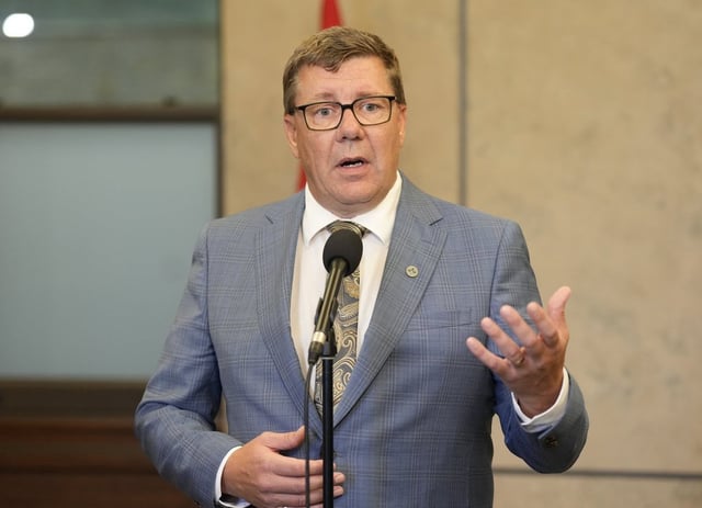 Saskatchewan Premier Scott Moe speaks with media following a meeting with the prime minister on Parliament Hill in Ottawa, Tuesday, Sept. 16, 2025. THE CANADIAN PRESS/Adrian Wyld