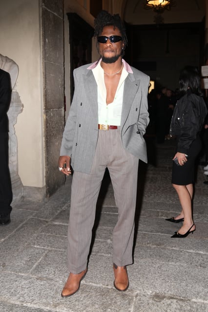 Singer Ob Obongjayar arrives for the Versace Intimate fashion event, in Milan, Friday, Sept. 26, 2025. (AP Photo/Antonio Calanni)