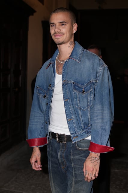 Romeo Beckham arrives for the Versace Intimate fashion event, in Milan, Friday, Sept. 26, 2025. (AP Photo/Antonio Calanni)