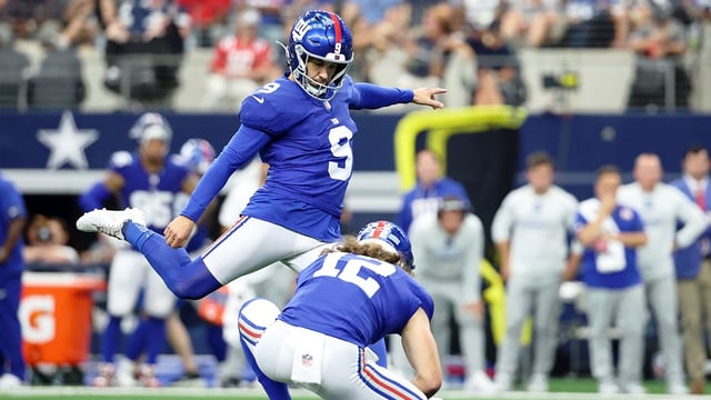 Sep 14, 2025; Arlington, Texas, USA; New York Giants place kicker Graham Gano (9) attempts a field goal against the Dallas Cowboys during the third quarter at AT&T Stadium. Mandatory Credit: Kevin Jairaj-Imagn Images