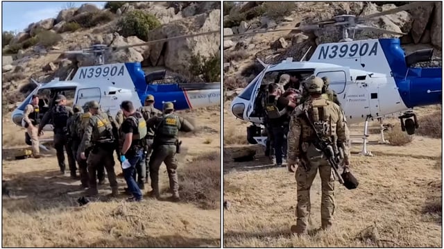 Federal agents carry a hiker to a helicopter to be taken to a hospital after the hiker was shot and robbed Wednesday in the Valley of the Moon area east of Jacumba Hot Springs. (US Border Patrol, El Centro Sector)