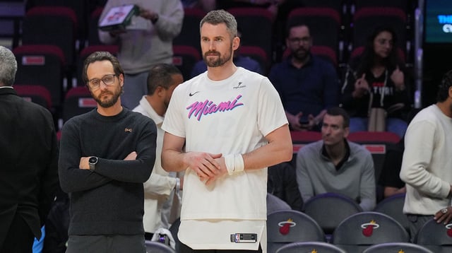 Heat forward Kevin Love (42) looks on during warm-ups before the game against the Cleveland Cavaliers at Kaseya Center