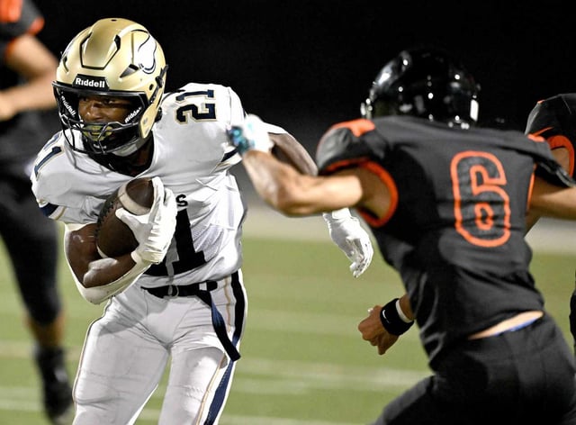 Moreno Valley running back Trevon Williams (21) prepares to be stopped by Chaffey’s Jessie Flores Jr. (6) during the first half at Chaffey High School in Ontario on Thursday, Sept. 25, 2025. Chaffey hosts Moreno Valley in a nonleague prep football game. (Photo by Will Lester, Inland Valley Daily Bulletin/SCNG)