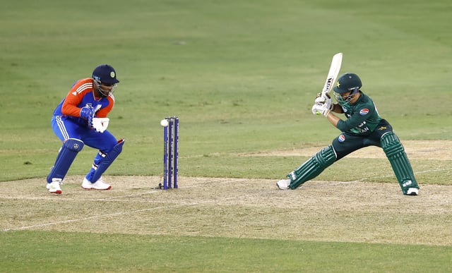 Cricket - Asia Cup - Group A - India v Pakistan - Dubai International Cricket Stadium, Dubai, United Arab Emirates - September 21, 2025 Pakistan's Salman Ali Agha in action with India's Sanju Samson REUTERS/Raghed Waked/File Photo