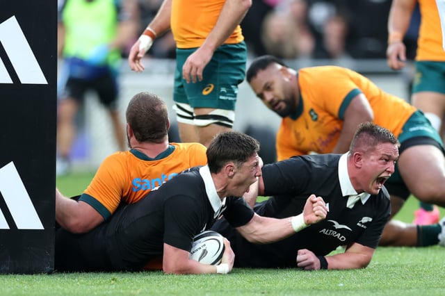 AUCKLAND, NEW ZEALAND - SEPTEMBER 27: Cam Roigard of New Zealand celebrates with Ethan de Groot of New Zealand after scoring a try during the The Rugby Championship & Bledisloe Cup match between New Zealand All Blacks and Australia Wallabies at Eden Park on September 27, 2025 in Auckland, New Zealand. (Photo by Phil Walter/Getty Images)