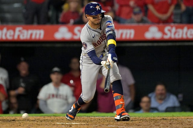 Houston Astros' Mauricio Dubon strikes out for the final out of the ninth inning of a baseball game against the Los Angeles Angels, Friday, Sept. 26, 2025, in Anaheim, Calif. (AP Photo/Jayne Kamin-Oncea)