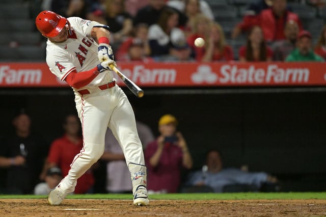 Los Angeles Angels' Mike Trout hits a solo home run during the eighth inning of a baseball game against the Houston Astros, Friday, Sept. 26, 2025, in Anaheim, Calif. (AP Photo/Jayne Kamin-Oncea)