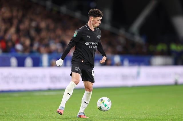 Phil Foden of Manchester City controls the ball during the Carabao Cup Third Round match between Huddersfield Town and Manchester City at Accu Stadium on September 24, 2025 in Huddersfield, England.