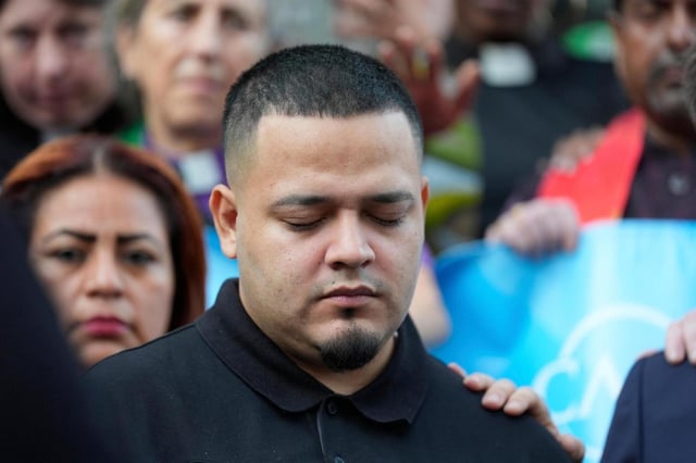 Kilmar Abrego Garcia attends a protest rally at the Immigration and Customs Enforcement field office in Baltimore, Monday, Aug. 25, 2025. (AP Photo/Stephanie Scarbrough)