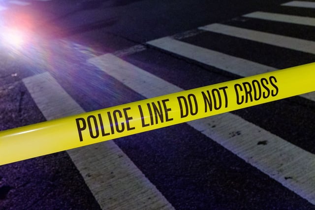 Police tape at a crime scene. (crime scene, crimescene, police, tape, web stock)