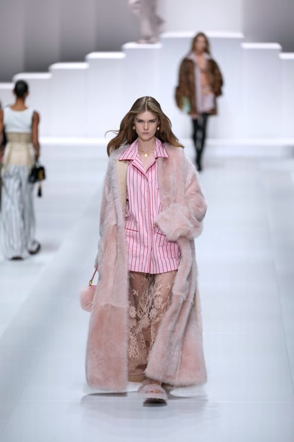 A model wears a creation as part of the Dolce & Gabbana Spring/Summer 2026 collection presented in Milan, Italy, Saturday, Sept. 27, 2025. (AP Photo/Luca Bruno)