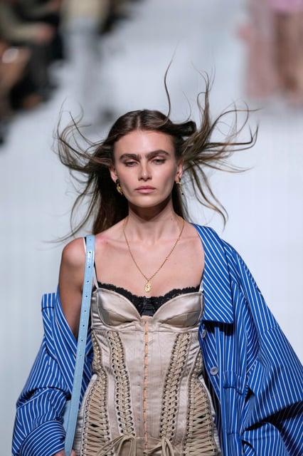 A model wears a creation as part of the Dolce & Gabbana Spring/Summer 2026 collection presented in Milan, Italy, Saturday, Sept. 27, 2025. (AP Photo/Luca Bruno)