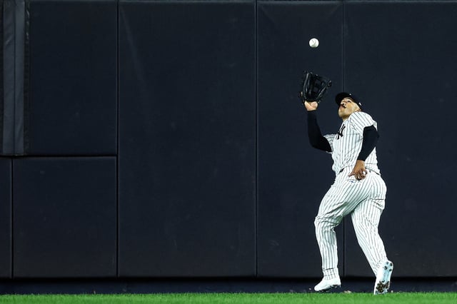 NEW YORK, NEW YORK - SEPTEMBER 25: Trent Grisham #12 of the New York Yankees catches a ball during the seventh inning against the Chicago White Sox at Yankee Stadium on September 25, 2025 in Bronx borough of New York City. (Photo by Ishika Samant/Getty Images)