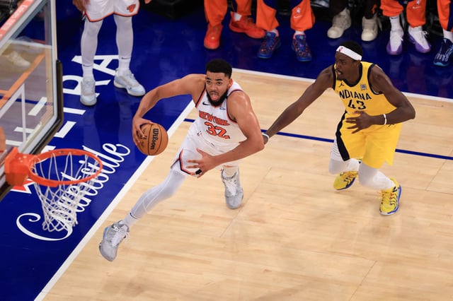 Knicks' center #32 Karl-Anthony Towns drives to the basket past Pacers' center #43 Pascal Siakam during Game Five of the Eastern Conference Finals of the 2025 NBA Playoffs between the New York Knicks and the Indiana Pacers at Madison Square Garden in New York on May 29, 2025. (Photo by CHARLY TRIBALLEAU / AFP) (Photo by CHARLY TRIBALLEAU/AFP via Getty Images)