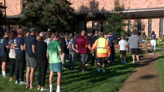 People gather for a special memorial service outside Annunciation Church on Sept. 27, 2025, marking one month since the tragic mass shooting. (KSTP-TV)