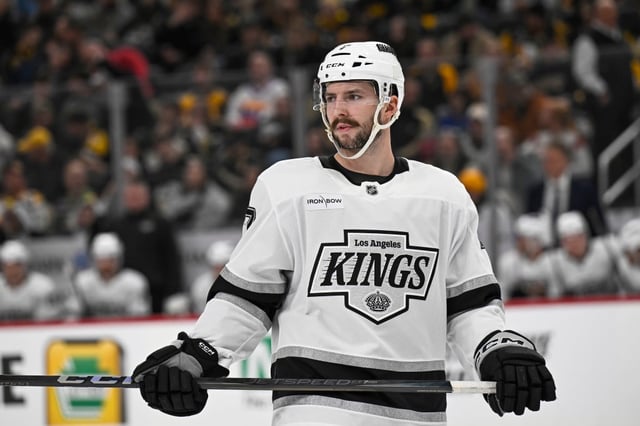 PITTSBURGH, PA - DECEMBER 17: Los Angeles Kings defenseman Kyle Burroughs (7) looks on during the first period in the NHL game between the Pittsburgh Penguins and the Los Angeles Kings on December 17, 2024, at PPG Paints Arena in Pittsburgh, PA. (Photo by Jeanine Leech/Icon Sportswire via Getty Images)