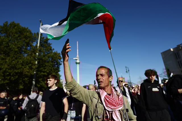People protest against Israel during a mass demonstration called "All Eyes on Gaza" in support of Palestinians in Berlin, Germany, Saturday, Sept. 27, 2025. (AP Photo/Christoph Soeder)