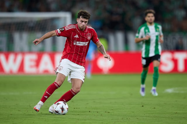 Neco Williams of Nottingham Forest FC runs with the ball during the UEFA Europa League 2025/26 League Phase MD1 match between Real Betis Balompie and Nottingham Forest FC at La Cartuja de Sevilla on September 24, 2025 in Seville, Spain.