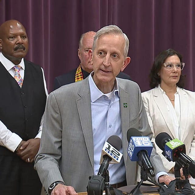 Portland Mayor Keith Wilson, surrounded by city, county, federal and faith leaders, says during a news conference Friday night, Sept. 26, 2025, that there has been an increase in federal presence at the ICE facility in South Portland. (KATU)