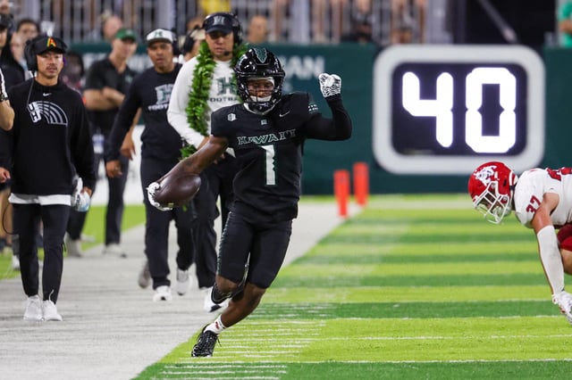 Brandon White #1 of the Hawaii Rainbow Warriors runs down the sideline after making a catch during the second half against the Fresno State Bulldogs at Clarence T.C. Ching Athletics Complex on September 20, 2025 in Honolulu, Hawaii.