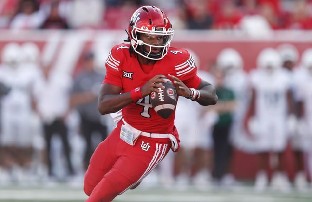 Devon Dampier #4 of the Utah Utes runs out of the pocket against of the Cal Poly Mustangs during the first half of their game at Rice-Eccles Stadium on September 6, 2025 in Salt Lake City, Utah.