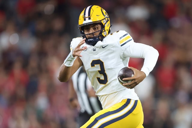Jaron-Keawe Sagapolutele #3 of the California Golden Bears scrambles during the first half of a game against the San Diego State Aztecs at Snapdragon Stadium on September 20, 2025 in San Diego, California.