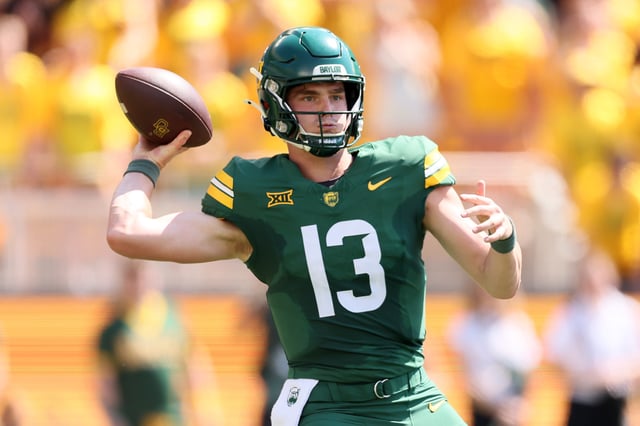 Sawyer Robertson #13 of the Baylor Bears throws a pass during the first half against the Samford Bulldogs at McLane Stadium on September 13, 2025 in Waco, Texas.