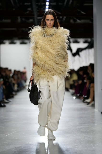 A model wears a creation during the Bottega Veneta women's Spring-Summer 2026 fashion show, in Milan, Italy, Saturday, Sept. 27, 2025. (AP Photo/Luca Bruno)