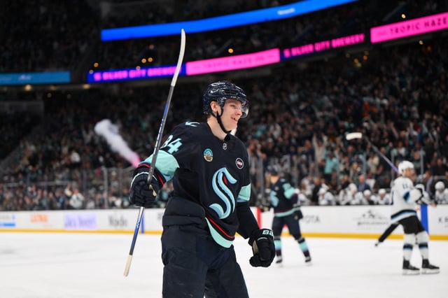 Mar 14, 2025; Seattle, Washington, USA; Seattle Kraken right wing Kaapo Kakko (84) celebrates after scoring a goal against the Utah Hockey Club during the third period at Climate Pledge Arena. Mandatory Credit: Steven Bisig-Imagn Images/File Photo