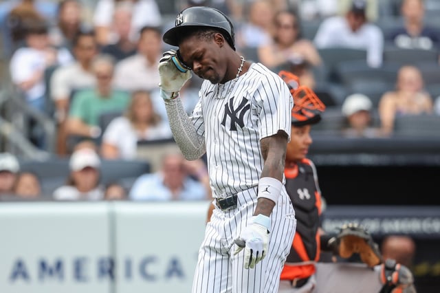 Sep 27, 2025; Bronx, New York, USA;  New York Yankees second baseman Jazz Chisholm Jr. (13) leaves the game after getting hit by a pitch in the fifth inning against the Baltimore Orioles at Yankee Stadium. Mandatory Credit: Wendell Cruz-Imagn Images